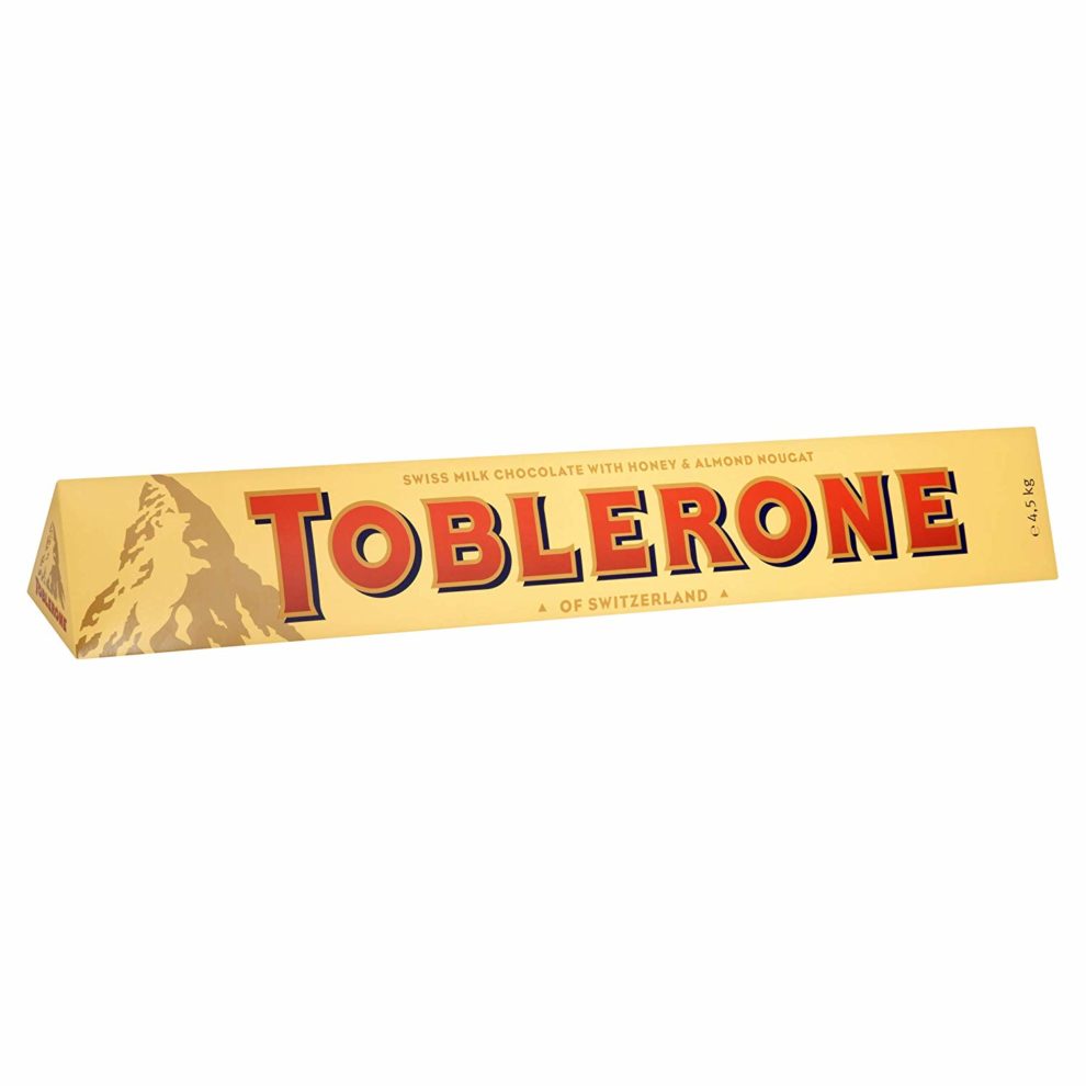 Шоколад toblerone купить. Швейцарский шоколад Тоблерон. Тоблерон молочный. Toblerone шоколад молочный с медово-миндальной нугой 100г. Шоколад Тоблерон с медово-миндальной нугой.